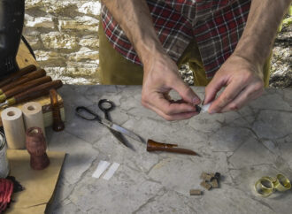 Adjusting the reeds for a duck call