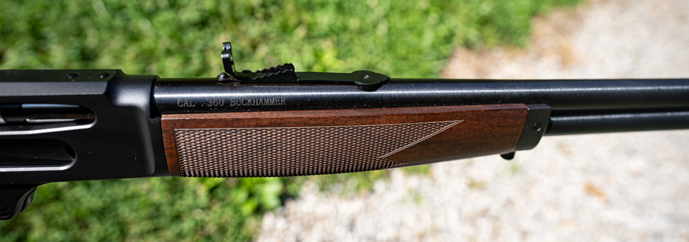 360 buck hammer stamped on the barrel of a henry lever action rifle