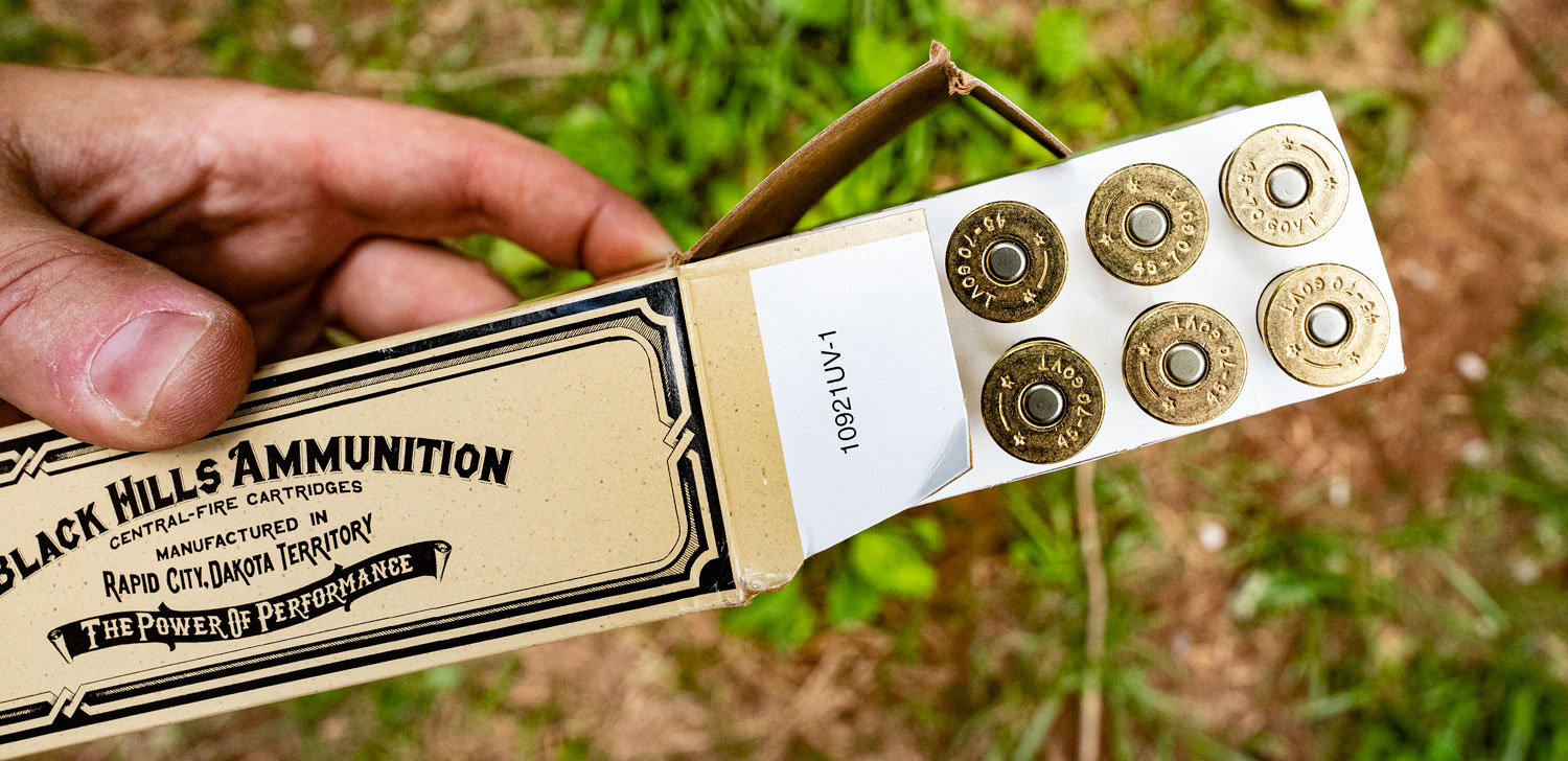 Black Hills 45-70 ammo in an ammo tray at a shooting range