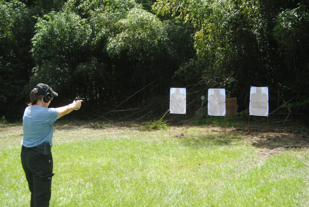 The author shooting the El Presidente drill outdoors at a range