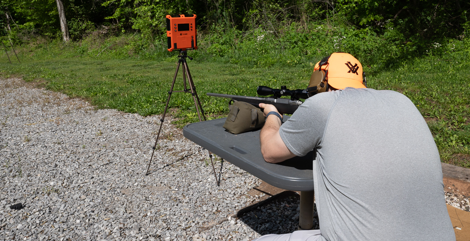 The author firing a 400 legend rifle at the range.