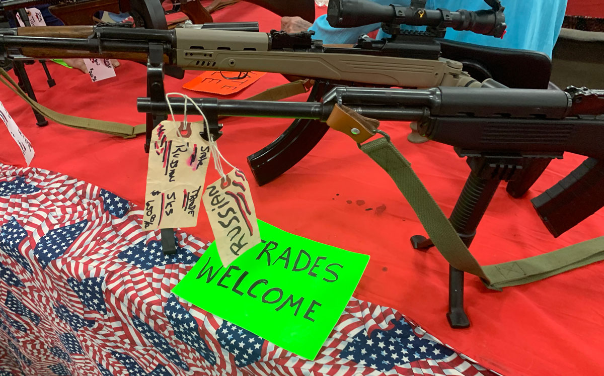 rifles for sale at a gun show