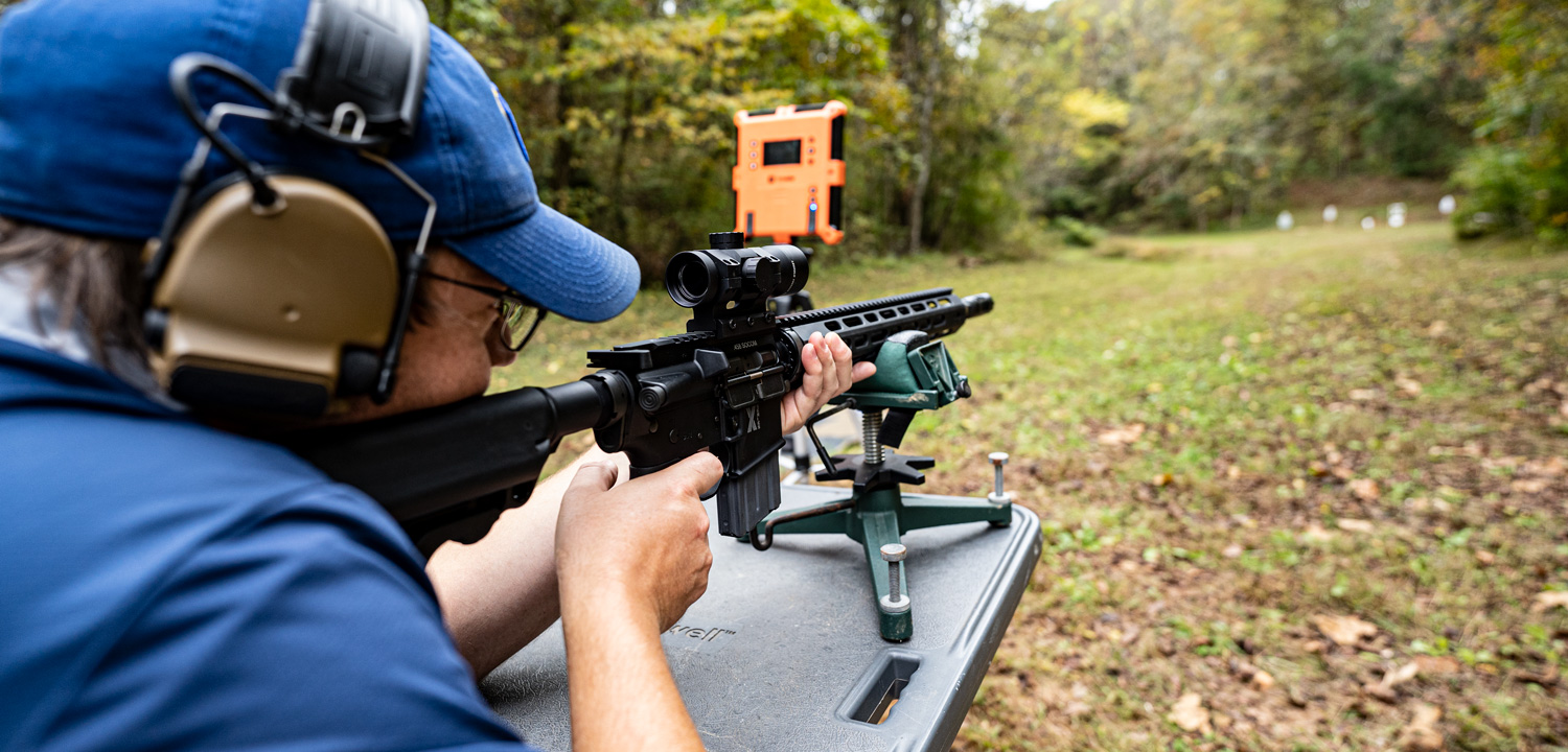 Shooting a 458 Socom rifle at a shooting range