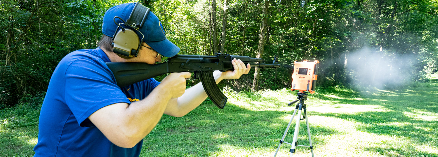 The author shooting 7.62x39 ammo with an AK-47 at a shooting range