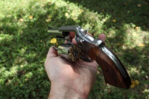 The Colt Viper with an open cylinder displayed at the shooting range.